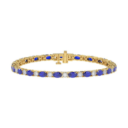 14K YELLOW GOLD 6 7/8CT ROUND/OVAL DIAMOND LADIES BRACELET (BLUE SAPPHIRE OVAL 6 1/6CT)