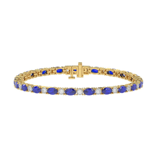 14K YELLOW GOLD 6 7/8CT ROUND/OVAL DIAMOND LADIES BRACELET (BLUE SAPPHIRE OVAL 6 1/6CT)