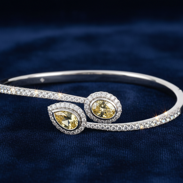 14K WHITE GOLD 3 1/2CT ROUND/OVAL/PEAR DIAMOND LADIES BANGLE (YELLOW PEAR/YELLOW OVAL DIAMOND)