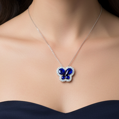 14K WHITE GOLD 1 1/5CT ROUND/PEAR DIAMOND LADIES PENDANT (CENTER STONE PEAR BLUE 1.00CT)